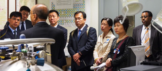 Dr. Abdul Mabud, SSD Director, leads the AQSIQ through the instrument room and details TTB testing procedures.