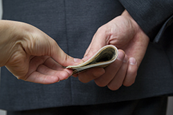 New York Man Pleads Guilty to Bribing Naval Employee to Allow Unauthorized Liquor Purchases 