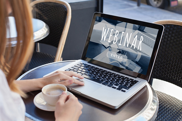 Graphic of a laptop with the word Webinar.